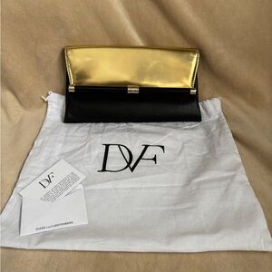 Diane Von Furstenberg evening clutch
Beautiful. Immaculately clean!!!